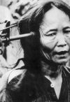 Vietnamese woman with a gun to her head, Vietnam War, 1969 (Keystone / Hulton Images / Getty)