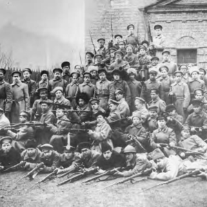 A detachment of worker Red Guards poses for a photograph before departing for the front. Photograph by Ia. Shteinberg