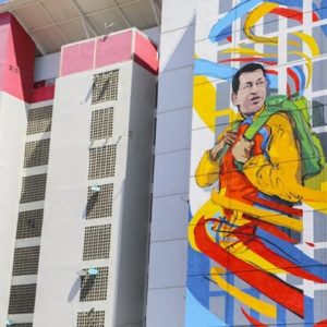 A mural of Hugo Chávez on a Housing Mission building. (Comando Creativo)