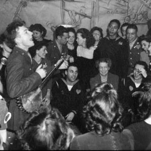 Pete Seeger at the opening of a canteen for the United Federal Workers of America, a trade union representing federal employees, in then-segregated Washington, DC