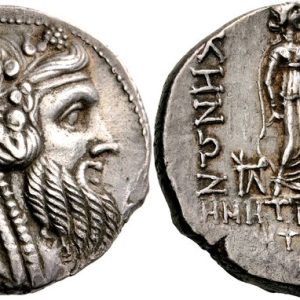 Bearded head of Priapos (left)