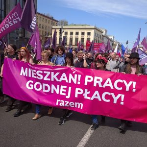 Together banner carried during the May Day march in Warsaw (2022)