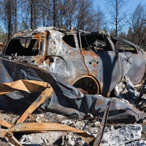 Charred remains of a vehicle eight months after the devastating Camp Fire