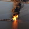 A gas pipeline burns after a collision with a barge and the tugboat Shannon E. Setton near Perot Bay in Lafourche Parish, LA on March 13, 2013