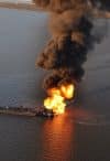 A gas pipeline burns after a collision with a barge and the tugboat Shannon E. Setton near Perot Bay in Lafourche Parish, LA on March 13, 2013